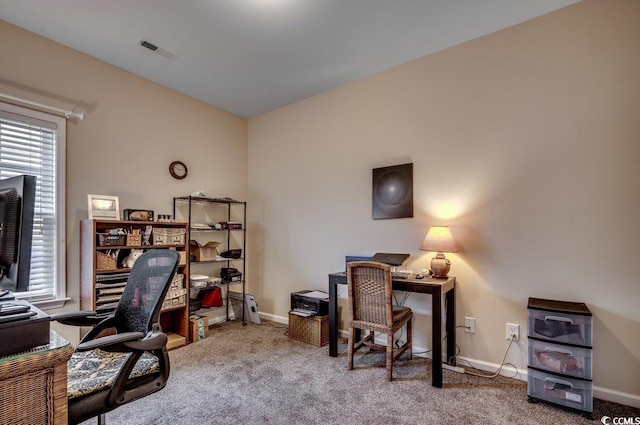 view of carpeted office space