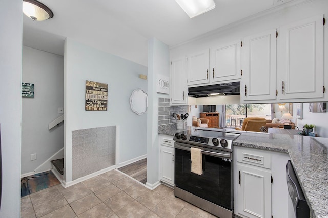 kitchen with white cabinetry, light tile patterned floors, and appliances with stainless steel finishes