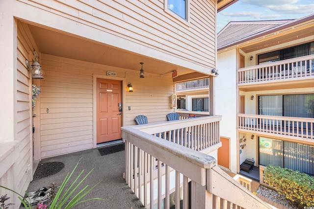 property entrance with a balcony