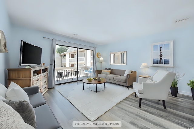 living room featuring light hardwood / wood-style floors