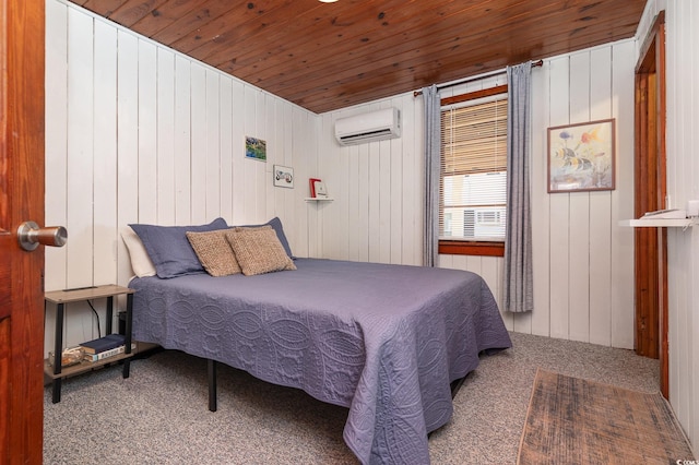 carpeted bedroom with wooden walls, wood ceiling, and a wall mounted air conditioner