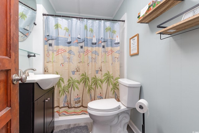 bathroom with a shower with curtain, vanity, toilet, and ornamental molding