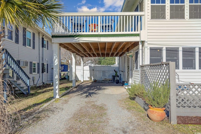 view of vehicle parking featuring a carport