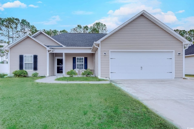 ranch-style home with a front yard and a garage