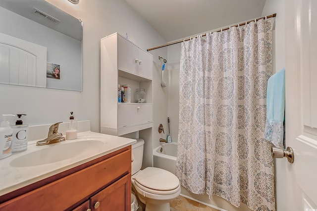 full bathroom featuring shower / bathtub combination with curtain, tile patterned flooring, vanity, and toilet