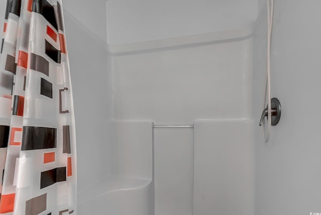 bathroom featuring walk in shower