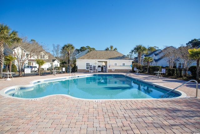 view of pool featuring a patio