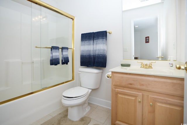 full bathroom with shower / bath combination with glass door, tile patterned flooring, toilet, and vanity