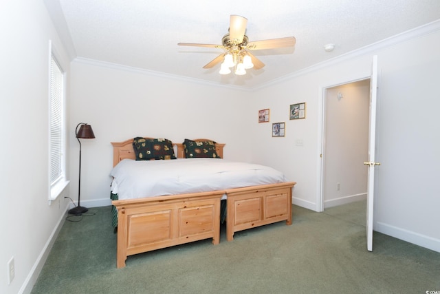 bedroom featuring dark carpet, ceiling fan, and crown molding