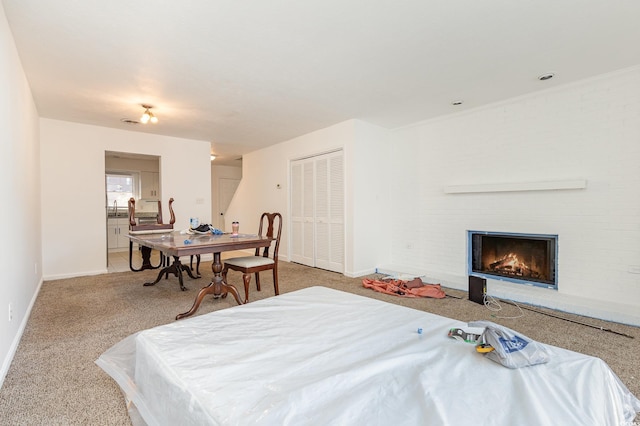 bedroom with light colored carpet and a closet