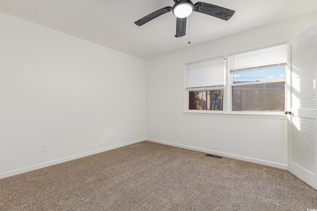 1025 Carolina Rd Unit Y-1, Conway, SC 29526 - carpeted empty room featuring baseboards, a ceiling fan, and visible vents
