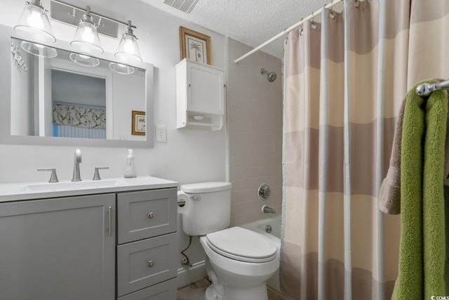 full bathroom featuring vanity, shower / bath combination with curtain, a textured ceiling, and toilet