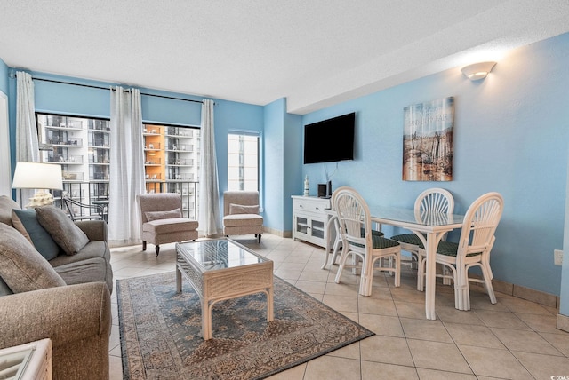 tiled living room with a textured ceiling