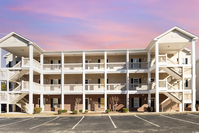 view of outdoor building at dusk