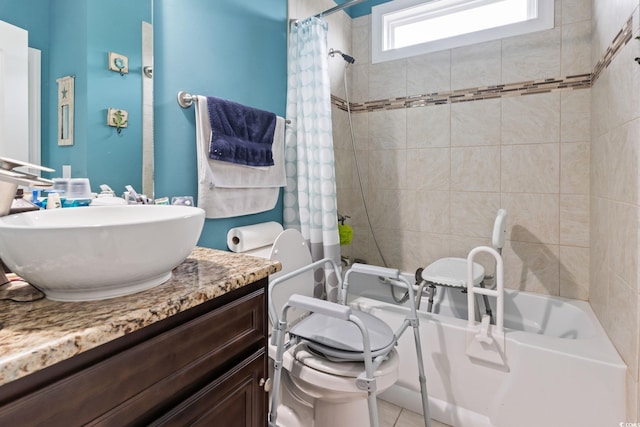 bathroom featuring shower / bath combo and vanity