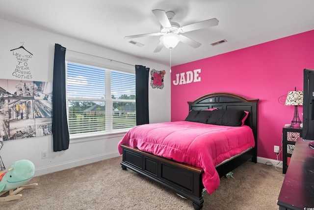 bedroom featuring ceiling fan and light colored carpet