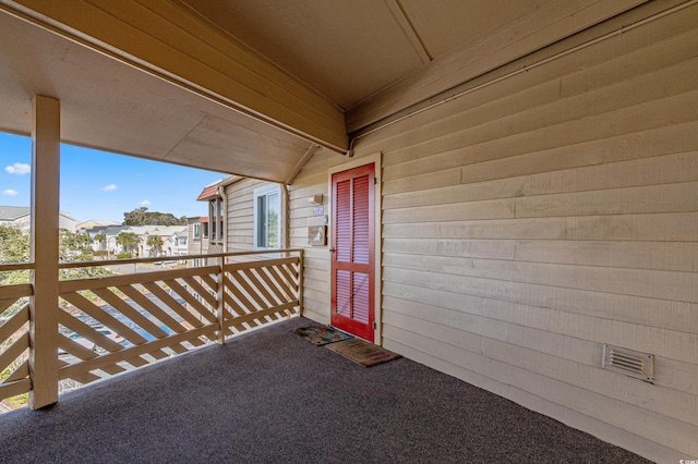 doorway to property with a balcony