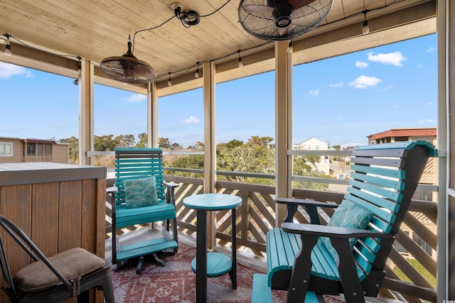 sunroom with wooden ceiling