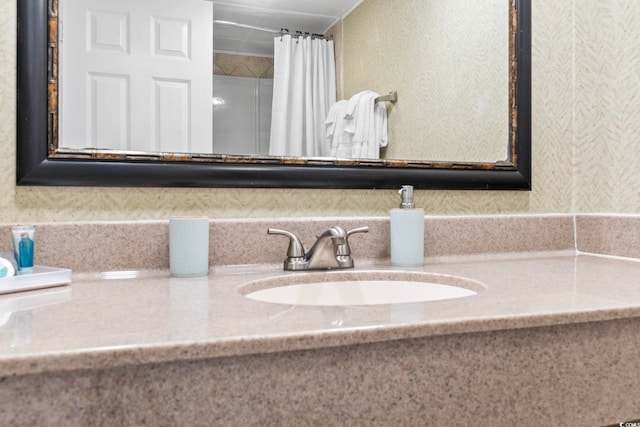 bathroom featuring vanity and walk in shower