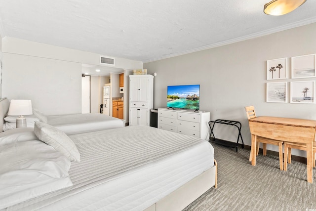 bedroom with carpet flooring and ornamental molding