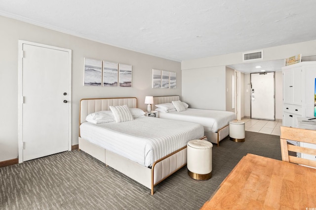 bedroom featuring tile patterned floors