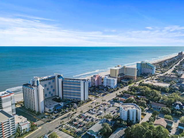 bird's eye view with a beach view and a water view