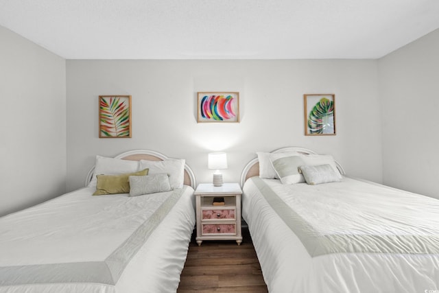 501 S Ocean Blvd Unit 708, North Myrtle Beach, SC 29582 - bedroom featuring dark wood-style floors