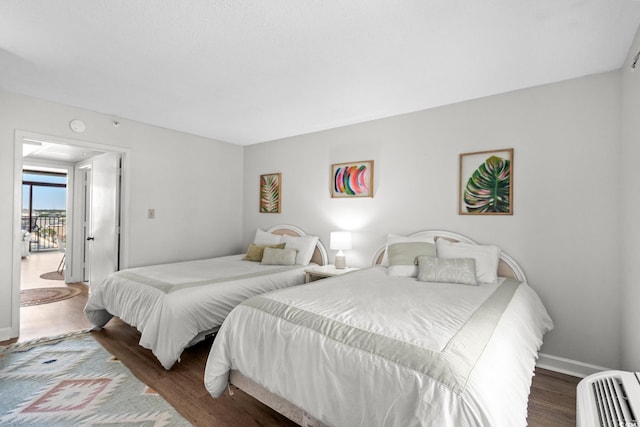 501 S Ocean Blvd Unit 708, North Myrtle Beach, SC 29582 - bedroom featuring wood finished floors and baseboards