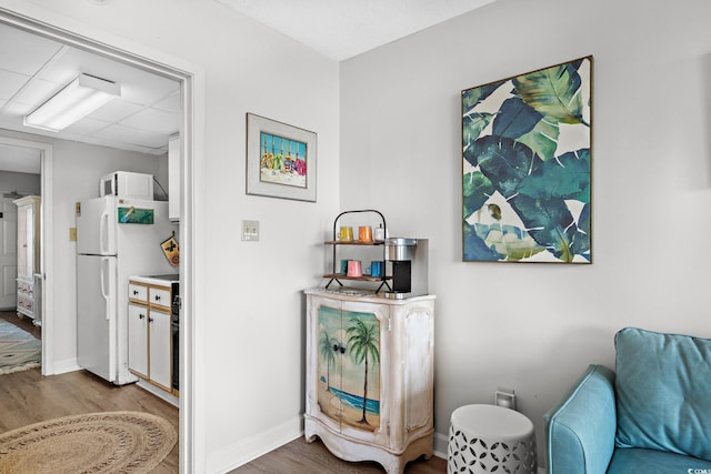 501 S Ocean Blvd Unit 708, North Myrtle Beach, SC 29582 - living area featuring wood finished floors and baseboards