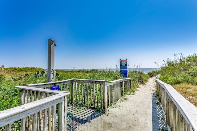 view of home's community featuring a water view