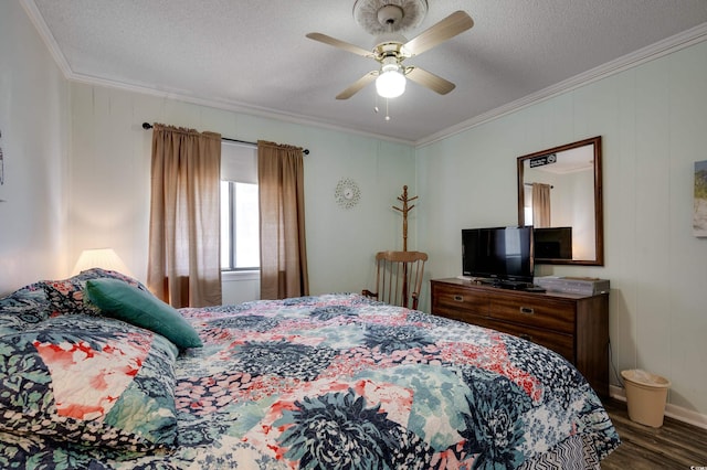 bedroom with a textured ceiling, ceiling fan, and crown molding