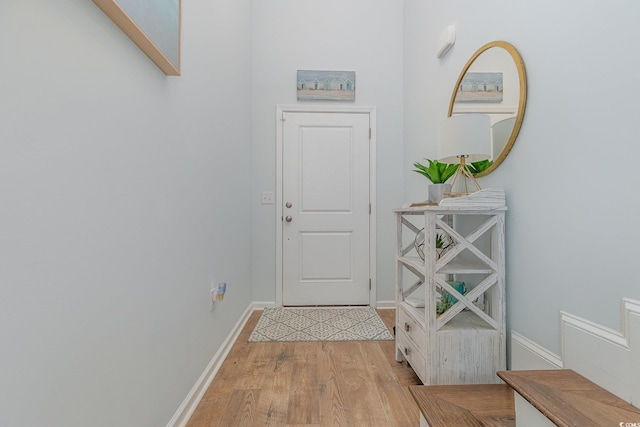 doorway with light hardwood / wood-style floors