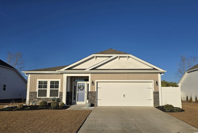 craftsman house with a garage