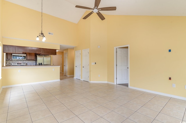 unfurnished living room featuring high vaulted ceiling, ceiling fan, and light tile patterned floors