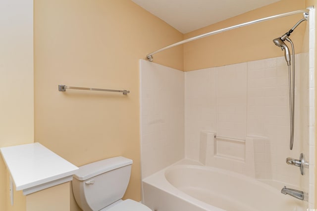 bathroom featuring shower / bathtub combination and toilet