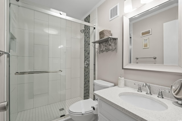 bathroom with vanity, toilet, crown molding, and walk in shower