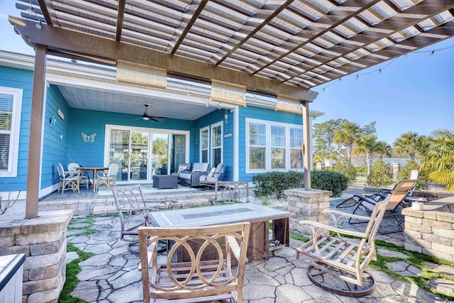 view of patio with an outdoor living space, a pergola, and ceiling fan