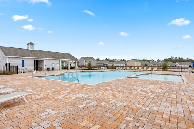 view of swimming pool featuring a patio