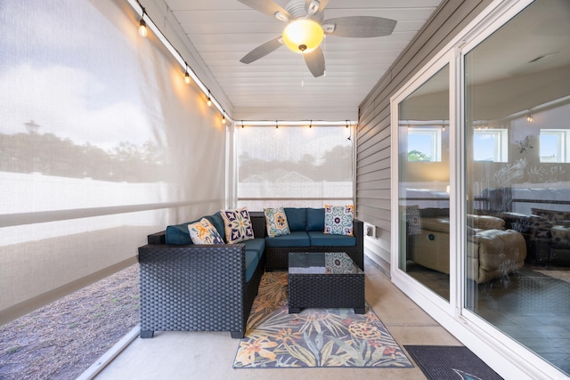 sunroom / solarium with ceiling fan