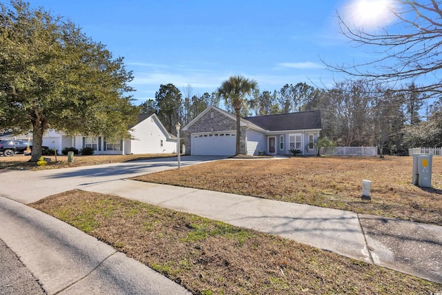 single story home featuring a garage