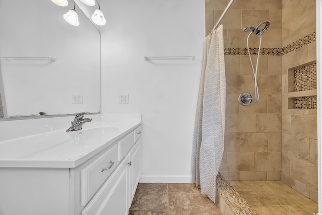 bathroom with curtained shower and vanity