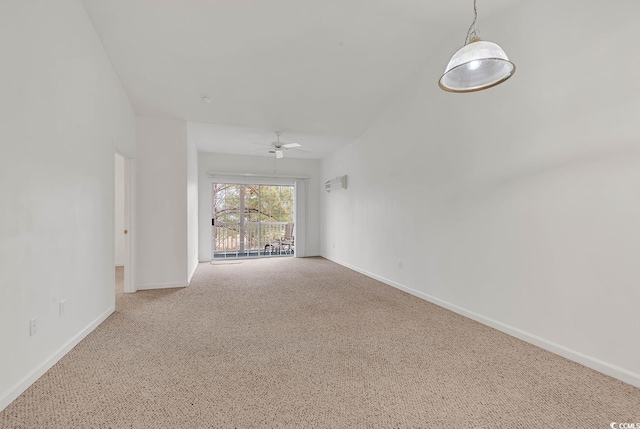 carpeted empty room with ceiling fan