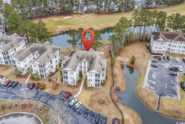 bird's eye view with a water view