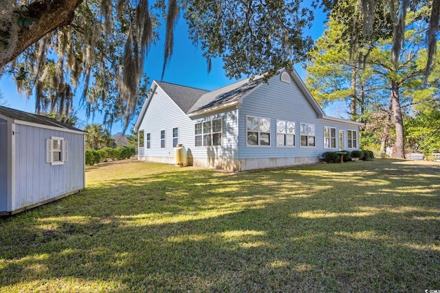 rear view of property with a lawn