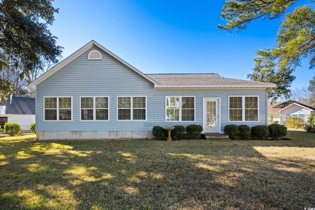 view of front of home with a front lawn