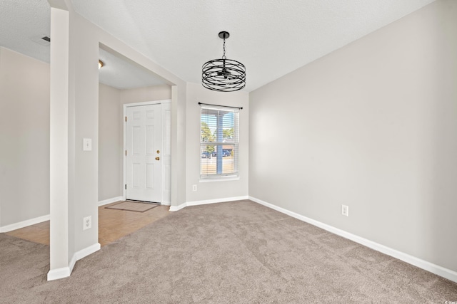 interior space featuring an inviting chandelier