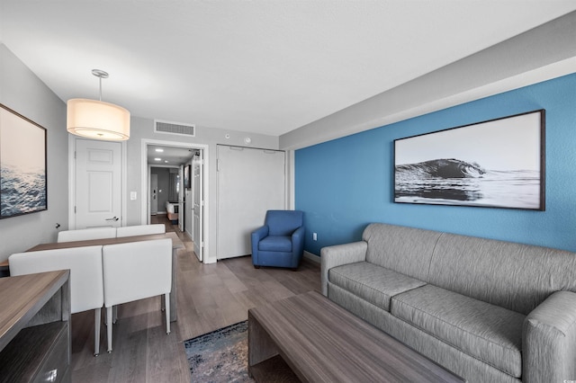 2006 N Ocean Blvd Unit 776, Myrtle Beach, SC 29577 - living room featuring wood finished floors and baseboards