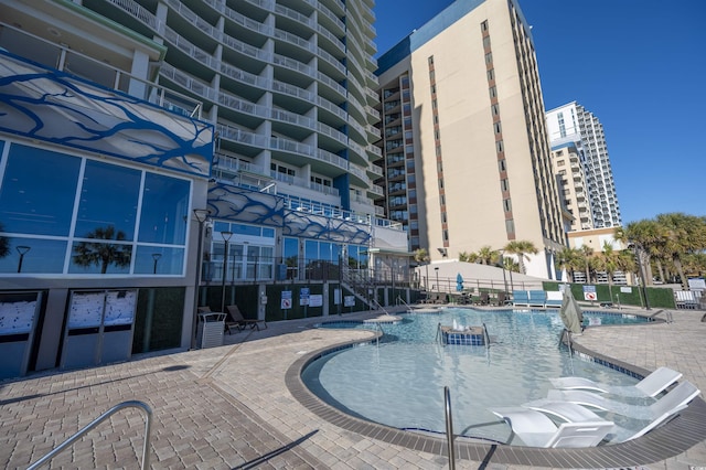 2006 N Ocean Blvd Unit 776, Myrtle Beach, SC 29577 - community pool with a patio area