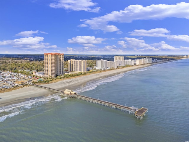 aerial view featuring a view of the beach and a water view