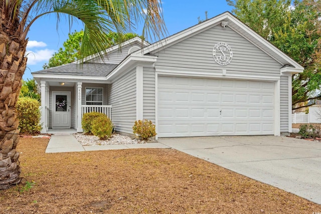 single story home with a porch and a garage